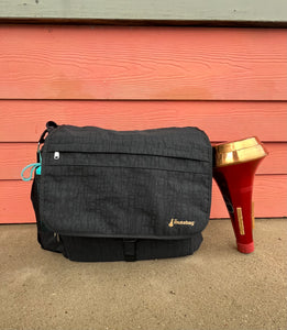 Black trombone bag with red mute